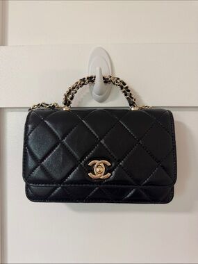 CHANEL Black Mini Bag with Gold Chained Shoulder Strap